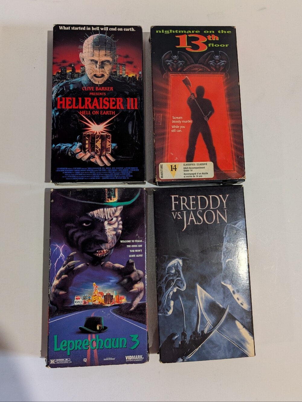 Vtg Horror VHS Movie Lot Of 4 Leprechaun Freddy Nightmare Hellraiser Cult
